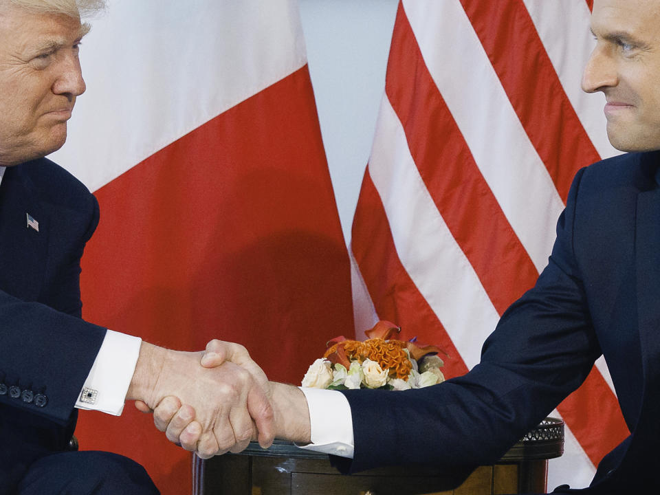 President Donald Trump shakes hands with French President Emmanuel Macron: AP