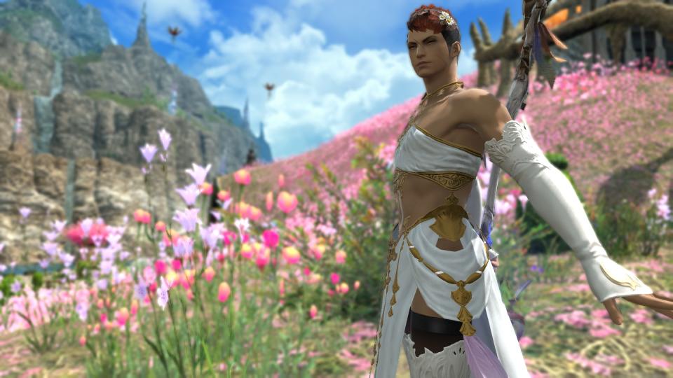 An image of a white mage in Final Fantasy 14, garbed in flowy white robes and striking an effeminate pose.