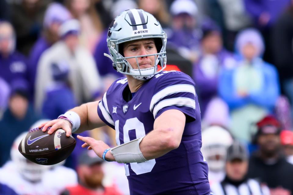 Kansas State quarterback Will Howard passes during the first half of an NCAA college football game against Houston in Manhattan, Kan., Saturday, Oct. 28, 2023. (AP Photo/Reed Hoffmann)