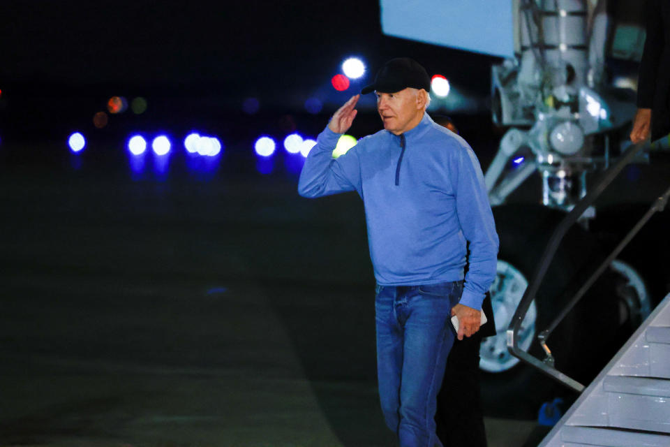 President Biden salutes upon arriving at Joint Base Andrews.