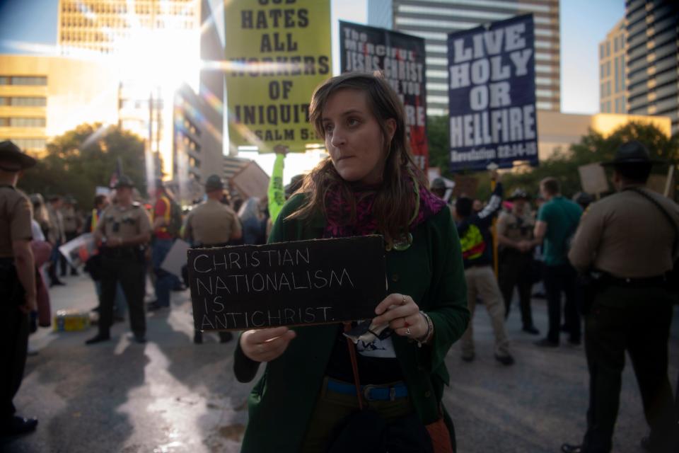 Counter protesters attend a rally against gender affirming care at War Memorial Plaza  in Nashville , Tenn., Friday, Oct. 21, 2022.