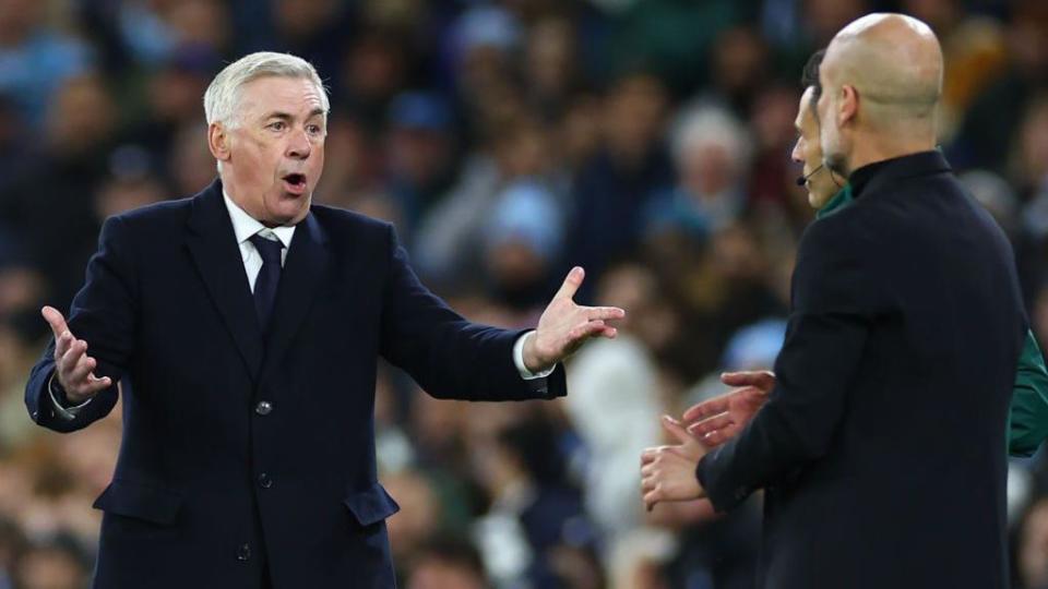 Real Madrid Manager Carlo Ancelotti reacts to Manchester City Manager Pep Guardiola