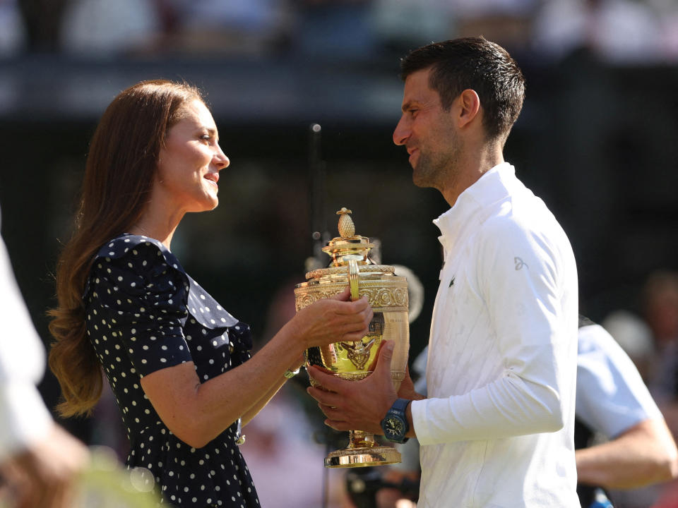 <p>The Duchess of Cambridge presents the Wimbledon men's singles trophy to Serbia's Novak Djokovic. (Reuters)</p> 