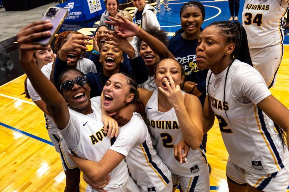 St. Thomas Aquinas players react after defeating Charlotte 49-35 during the Class 6A state Girl’s basketball championship game at RP Funding Center in Lakeland, Florida, on Saturday, February 25, 2023.