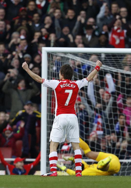 Arsenal's Tomas Rosicky celebrates after scoring during the Premier League match against Everton at Emirates stadium on March 1, 2015