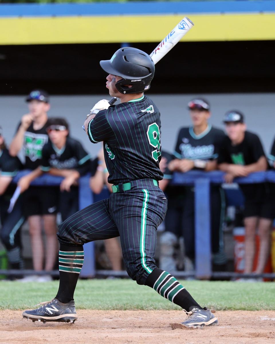 Mason catcher Brady Bly rips a two-run double in the game between Mason and Moeller high schools at Midland Field June 4, 2022.