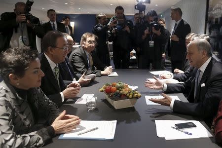 French Foreign Minister Laurent Fabius, President-designate of COP21, talks to United Nations Secretary General Ban Ki-moon and Executive Secretary of the UN Framework Convention on Climate Change (UNFCCC) Christiana Figueres during the World Climate Change Conference 2015 (COP21) at Le Bourget, near Paris, France, December 5, 2015. REUTERS/Stephane Mahe