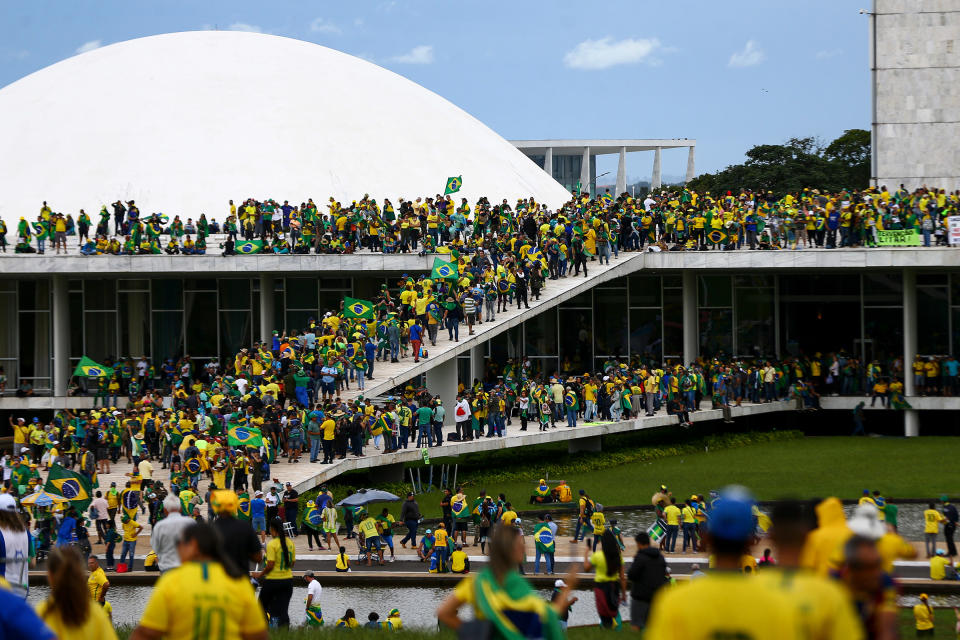 Supporters of former Brazilian president Jair Bolsonaro storm the Brazilian Parliament, Supreme Court and Presidential Palace in Brasilia, Brazil, Jan. 8, 2023.<span class="copyright">Marcelo Correia—Camera Press/Redux</span>