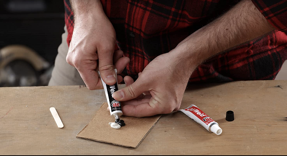 Mixing Epoxy on Cardboard Plate