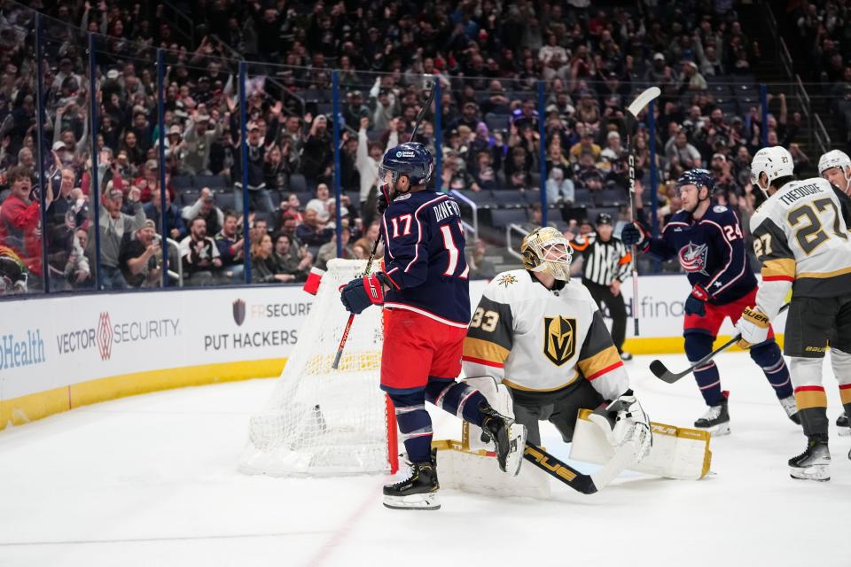 Mar 4, 2024; Columbus, Ohio, USA; Columbus Blue Jackets right wing Justin Danforth (17) celebrates a goal in front of Vegas Golden Knights goaltender Adin Hill (33) during the first period of the NHL hockey game at Nationwide Arena.