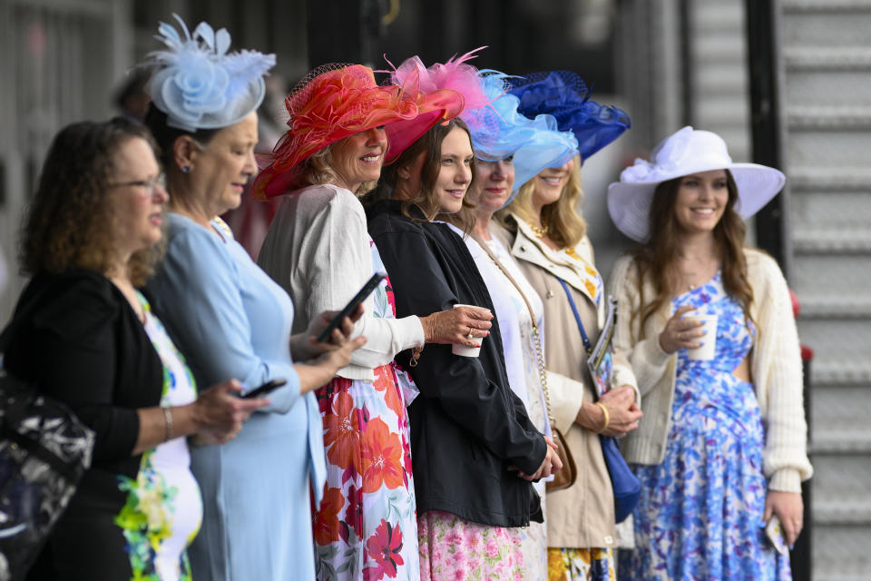 Women wear decorative hats ahead of the Preakness Stakes horse race at Pimlico Race Course, Saturday, May 18, 2024, in Baltimore. (AP Photo/Nick Wass)