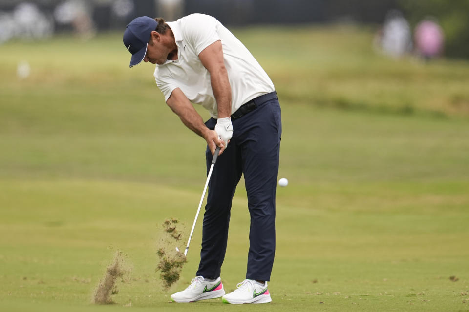 Brooks Koepka hits from the fairway on the second hole during the first round of the U.S. Open golf tournament at Los Angeles Country Club on Thursday, June 15, 2023, in Los Angeles. (AP Photo/George Walker IV)