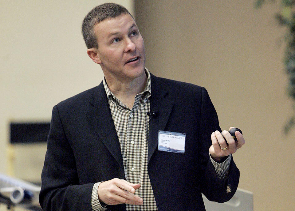 FILE - In this March 14, 2007, file photo, US Airways President Scott Kirby addresses members of the media at US Airways headquarters in Tempe, Ariz. United Airlines CEO Munoz is stepping down from his post and will become executive chairman. The airline said Thursday, Dec. 5, 2019, that Kirby will be its new CEO. (AP Photo/Matt York, File)