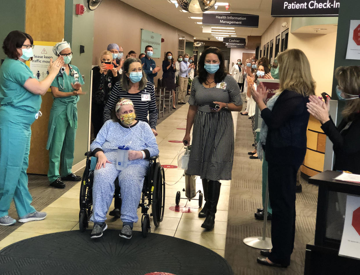 Colorado hospital staff lined the hallways of UC Health to bid farewell to a nurse who recovered from COVID-19. (Photo: Courtesy of UCHealth)