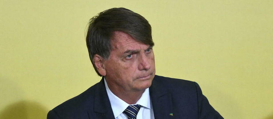 Jair Bolsonaro avait été&nbsp;battu de justesse par le candidat de gauche Luiz Inacio Lula da Silva à la présidentielle d'octobre.  - Credit:JOAO GABRIEL RODRIGUES / Agência Estado via AFP