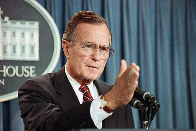 President George Bush speaks about flag-burning, Panama and abortion legislation during an impromptu news conference at the White House on Oct. 13, 1989.