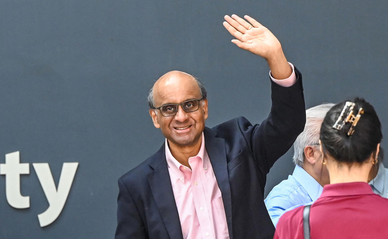 Singapore's new Indian president, Tharman Shanmugaratnam, waving at the crowd.