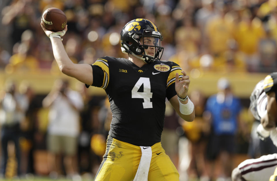 Iowa quarterback Nate Stanley throws a pass against Mississippi State during the second half of the Outback Bowl NCAA college football game Tuesday, Jan. 1, 2019, in Tampa, Fla. (AP Photo/Chris O'Meara)