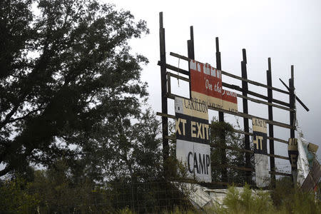 Fragments remain of billboard after Hurricane Irma in White Springs, Florida U.S. September 11, 2017. REUTERS/Mark Makela