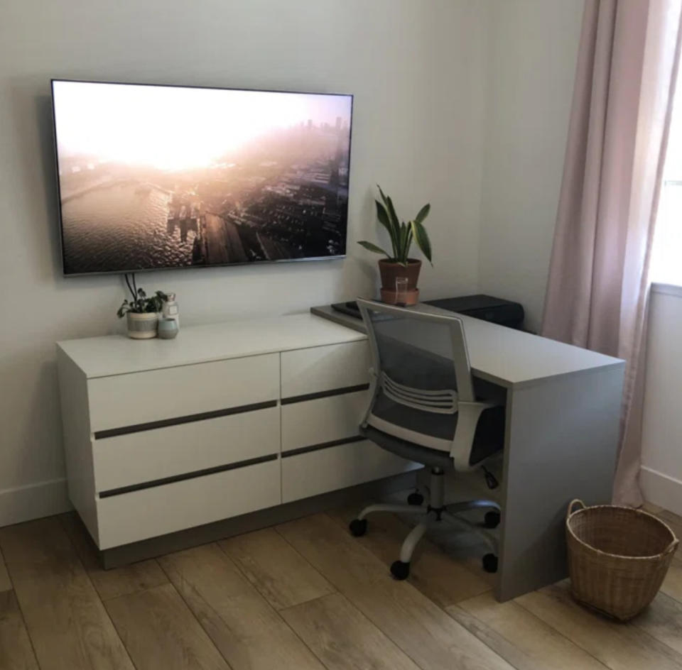 an desk drawer combo with the desk expanded