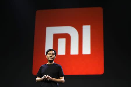 Lei Jun, founder and CEO of China's mobile company Xiaomi, speaks at a launch ceremony of Xiaomi Phone 4, in Beijing, July 22, 2014. REUTERS/Jason Lee