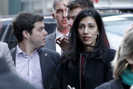 Huma Abedin, aide to U.S. Democratic presidential candidate Hillary Clinton, looks on as Clinton makes a campaign stop in the Manhattan borough of New York April 13, 2016. REUTERS/Mike Segar
