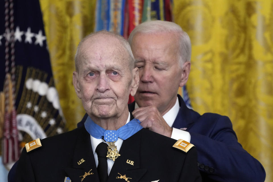 President Joe Biden awards the Medal of Honor to Capt. Larry Taylor, an Army pilot from the Vietnam War who risked his life to rescue a reconnaissance team that was about to be overrun by the enemy, during a ceremony Tuesday, Sept. 5, 2023, in the East Room of the White House in Washington. (AP Photo/Jacquelyn Martin)