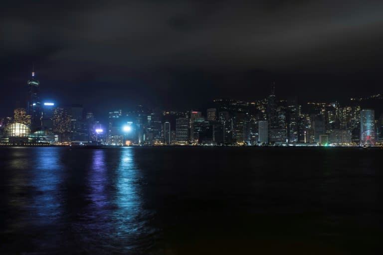 Hong Kong harbour skyline after the building lights were switched off for the Earth Hour environmental campaign