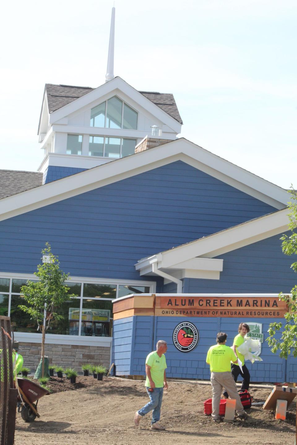 Workers Friday complete final touches to the Alum Creek State Park marina building, a 7,000 square-foot, $4.6 million structure that officials say has a nautical feel.