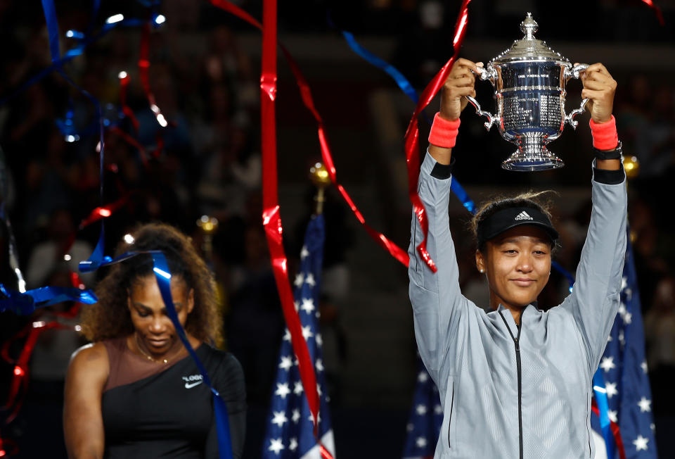 <p>NEW YORK, NY – SEPTEMBER 08: Naomi Osaka of Japan poses with the championship trophy after winning the Women’s Singles finals match against Serena Williams of the United States on Day Thirteen of the 2018 US Open at the USTA Billie Jean King National Tennis Center on September 8, 2018 in the Flushing neighborhood of the Queens borough of New York City. (Photo by Julian Finney/Getty Images) </p>