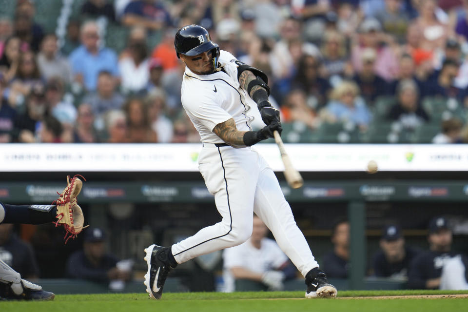 Detroit Tigers' Javier Baez hits a double against the Cleveland Guardians in the fifth inning of a baseball game, Monday, July 8, 2024, in Detroit. (AP Photo/Paul Sancya)