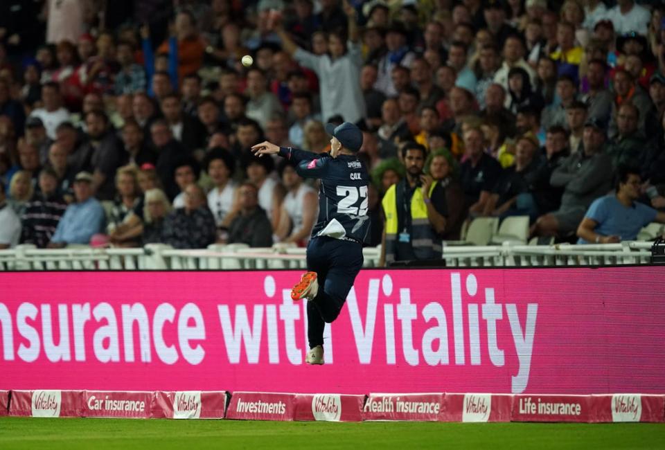 Jordan Cox palms the ball back into play for Matt Milnes’ catch (Mike Egerton/PA) (PA Wire)