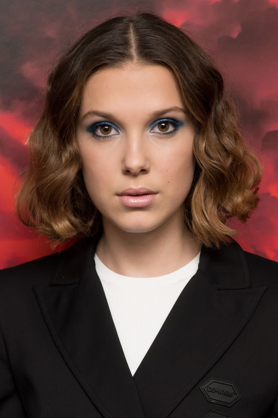 <p>You might recoil at the idea of wearing blue eyeshadow, haunted by memories of less successful teenage attempts, but Millie Bobby Brown's latest look should convince you to give it another shot. Yes, she's young, but her dusky blue eyes are decidedly chic and grown-up. In fact, we predict the shade will be a big autumn trend for all ages, due its ability to define, lift and brighten your eyes. The trick is to apply it in a winged shape across your eyelids, as well as over your lower lash line. We'd recommend Dior's <span>5 Couleurs Cool Wave Eyeshadow in Cool Down</span>amp;_$ja=tsid:35948%7ccid:198779374%7cagid:10881871534%7ctid:aud-86322337543:pla-490870183875%7ccrid:40370635054%7cnw:g%7crnd:711061027202048325%7cdvc:c%7cadp:1o3%7cmt:%7cloc:9072497&gclid=Cj0KCQjwk_TbBRDsARIsAALJSOatE74uEqj1hnVbdjiJ_HhTDzk4QpmryxDWybc9UCz-H3cz-VSllYgaAgByEALw_wcB&gclsrc=aw.ds&dclid=CLzX--HFgN0CFcR2wQodtnIOYg"" target="_blank">5 Couleurs Cool Wave Eyeshadow in Cool Downamp;_$ja=tsid:35948%7ccid:198779374%7cagid:10881871534%7ctid:aud-86322337543:pla-490870183875%7ccrid:40370635054%7cnw:g%7crnd:711061027202048325%7cdvc:c%7cadp:1o3%7cmt:%7cloc:9072497&gclid=Cj0KCQjwk_TbBRDsARIsAALJSOatE74uEqj1hnVbdjiJ_HhTDzk4QpmryxDWybc9UCz-H3cz-VSllYgaAgByEALw_wcB&gclsrc=aw.ds&dclid=CLzX--HFgN0CFcR2wQodtnIOYg" target="_blank">5 Couleurs Cool Wave Eyeshadow in Cool Down, £48.50, for a soft shimmery finish that still feels sophisticated.</p>