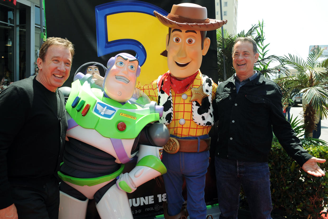 Tim Allen, left, and Tom Hanks arrive at the world premiere of Toy Story 3 on Sunday June 13, 2010 at The El Capitan Theater in Los Angeles. (AP Photo/Katy Winn)