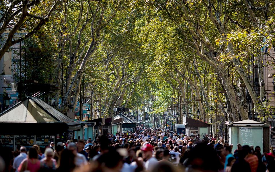 Las Rambles was thronging with crowds again on Friday, less than 24 hours after the attack - Getty