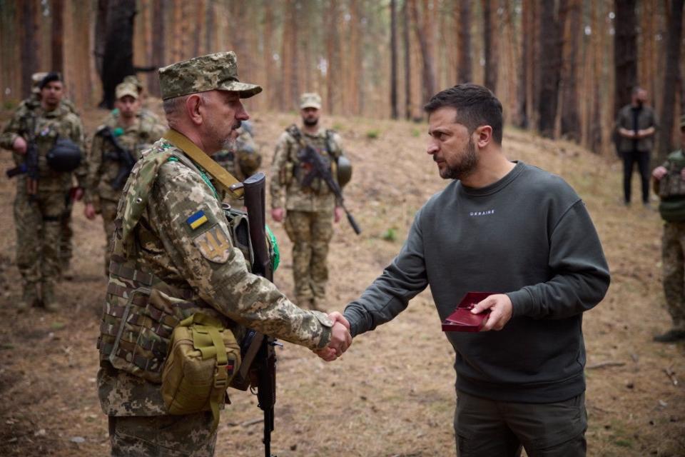 President of Ukraine Volodymyr Zelensky visit military positions on the front line between Lyman and Kupiansk on 3 Octorber (EPA)