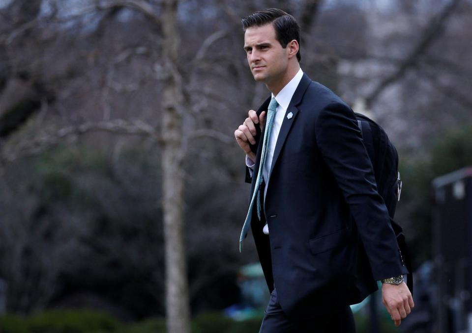 PHOTO: John McEntee walks to Marine One to join former President Donald Trump for travel to Florida in Washington, Feb. 16, 2018. (Leah Millis/Reuters, FILE)