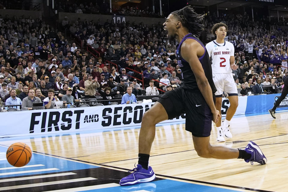 Grand Canyon guard Collin Moore reacts after his dunk against Saint Mary's during the first half of a first-round college basketball game in the men's NCAA Tournament in Spokane, Wash., Friday, March 22, 2024. (AP Photo/Ted S. Warren)