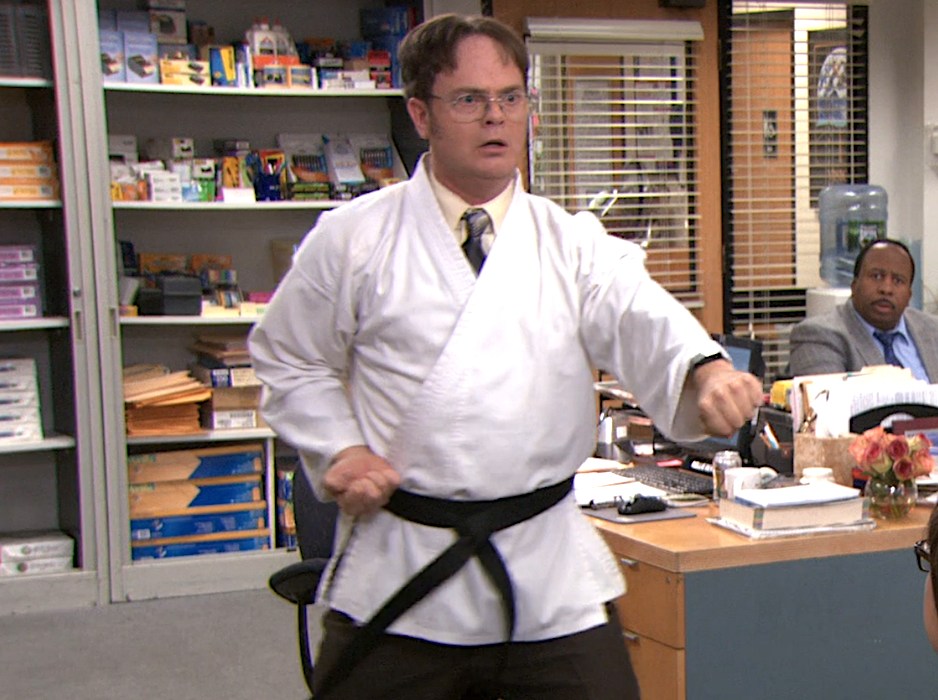 character wearing a black belt with punching in the office