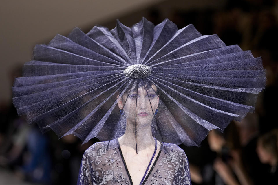 A model wears a creation for Giorgio Armani Prive as part of the Haute Couture Spring-Summer 2024 collection presented in Paris, Tuesday, Jan. 23, 2024. (AP Photo/Christophe Ena)