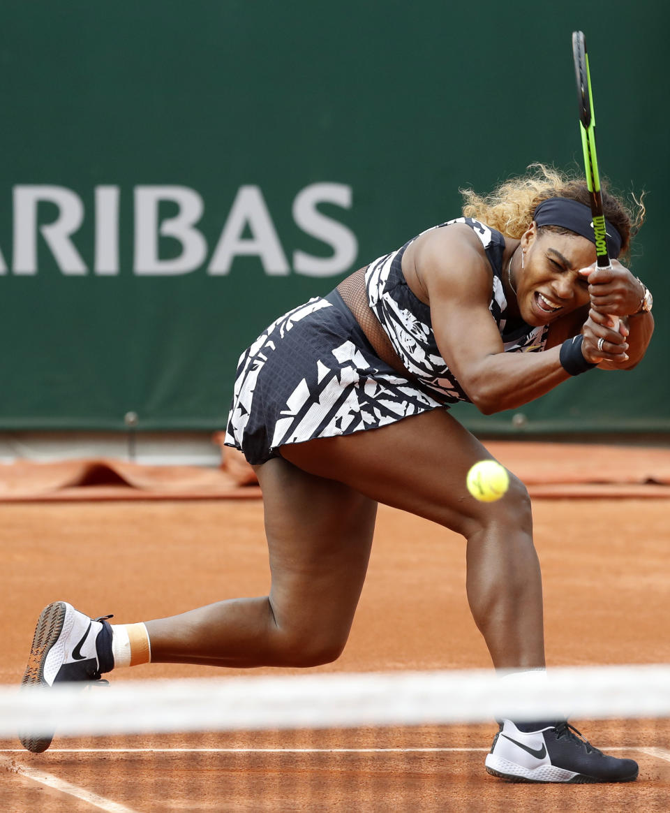 Serena Williams of the U.S. plays a shot against Vitalia Diatchenko of Russia during their first round match of the French Open tennis tournament at the Roland Garros stadium in Paris, Monday, May 27, 2019. (AP Photo/Pavel Golovkin)