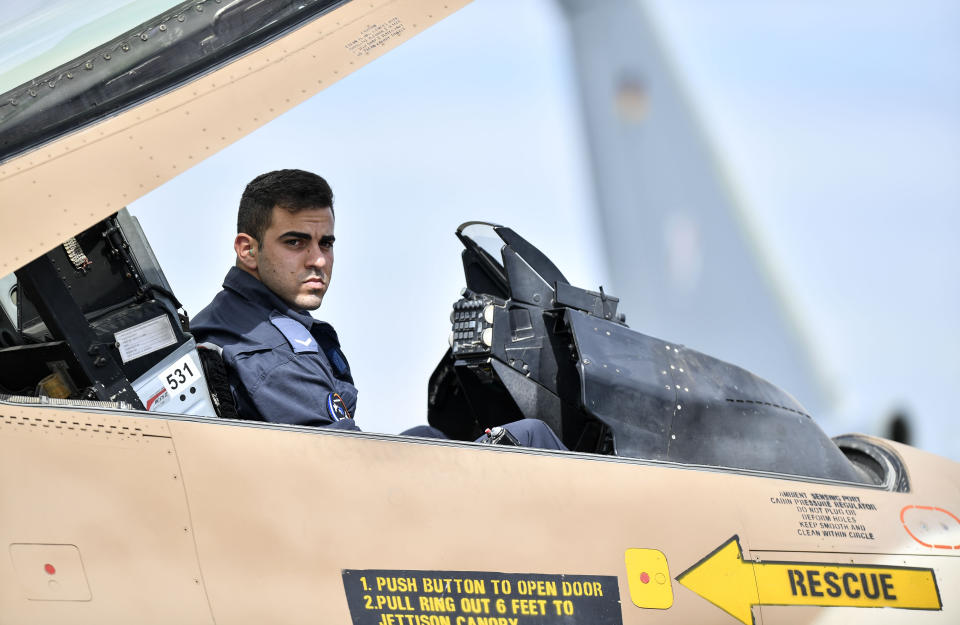 A technician from Israel sits in the cockpit of a F16 jet at the airbase in Noervenich, Germany, Thursday, Aug. 20, 2020. Pilots from Israel and Germany will fly together the next two weeks during the first joint military Air Force exercises between the two nations in Germany. (AP Photo/Martin Meissner)