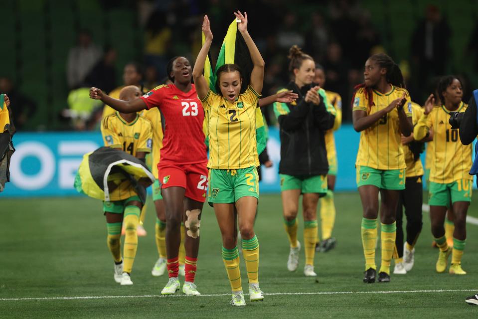 Jamaica's Solai Washington celebrates with her teammates after advancing out of the group stage at the Women's World Cup.