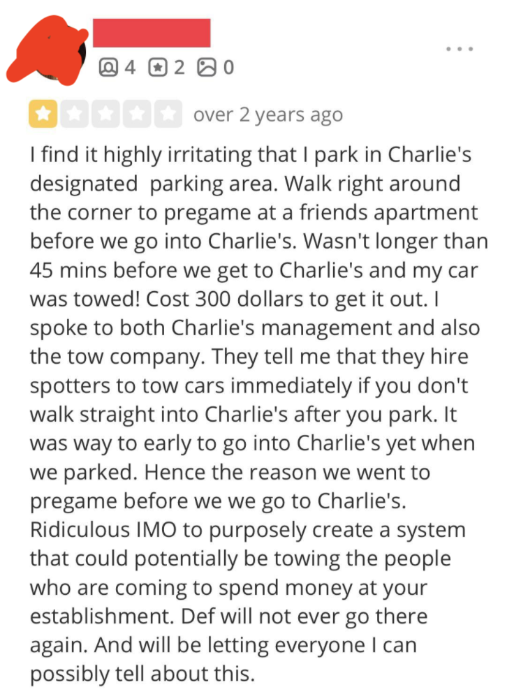 one-star review of "charlie's" angry that car was towed for parking in their lot then going to a friend's house, because they planned on going to charlie's after