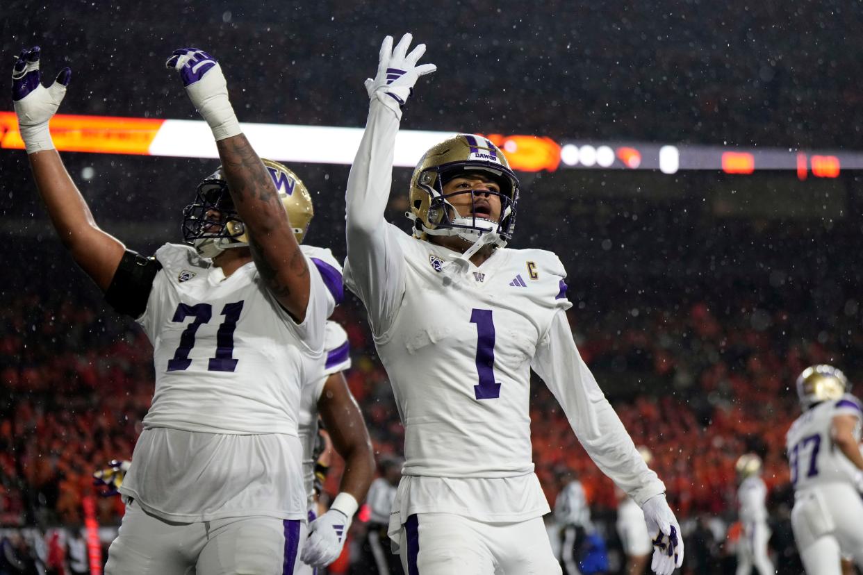Washington Huskies wide receiver Rome Odunze celebrates with teammates after scoring a touchdown during the first half against the Oregon State Beavers at Reser Stadium.