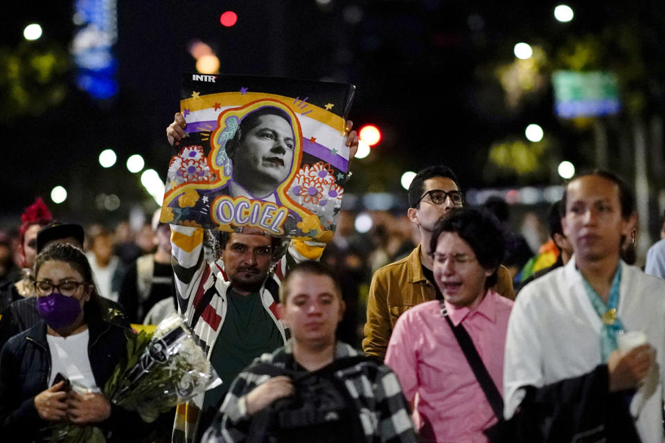 FILE - Demonstrators march during a protest seeking justice over the death of magistrate Ociel Baena, the first openly nonbinary person in Latin America to hold a judicial position, in Mexico City, Nov. 13, 2023. Baena was found dead with their partner at home in the central Mexican city of Aguascalientes after receiving death threats because of gender identity, authorities said. (AP Photo/Eduardo Verdugo, File)