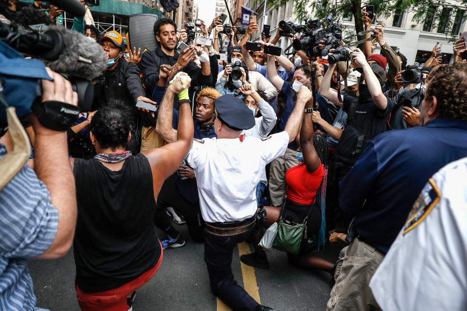 NEW YORK, UNITED STATES - 2020/06/01: Protesters and Chief of the Department of NYPD, Terence Monahan show their solidarity in Washington Square Park during a demonstration in response to the death of a Minneapolis man George Floyd. (Photo by John Lamparski/SOPA Images/LightRocket via Getty Images)