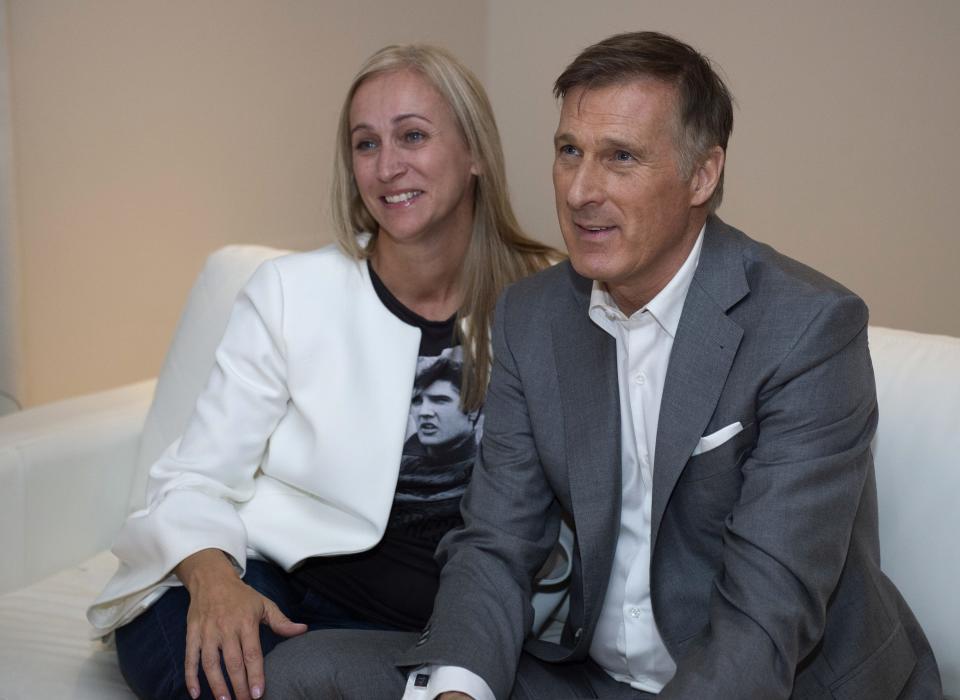 Maxime Bernier and his wife Catherine Letarte watch election results