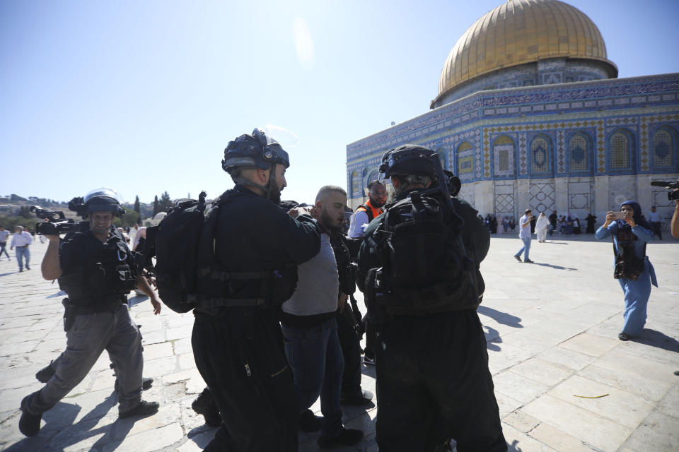 Israeli police arrests a Palestinian worshipper at al-Aqsa mosque compound in Jerusalem, Sunday, Aug 11, 2019.(AP Photo/Mahmoud Illean)