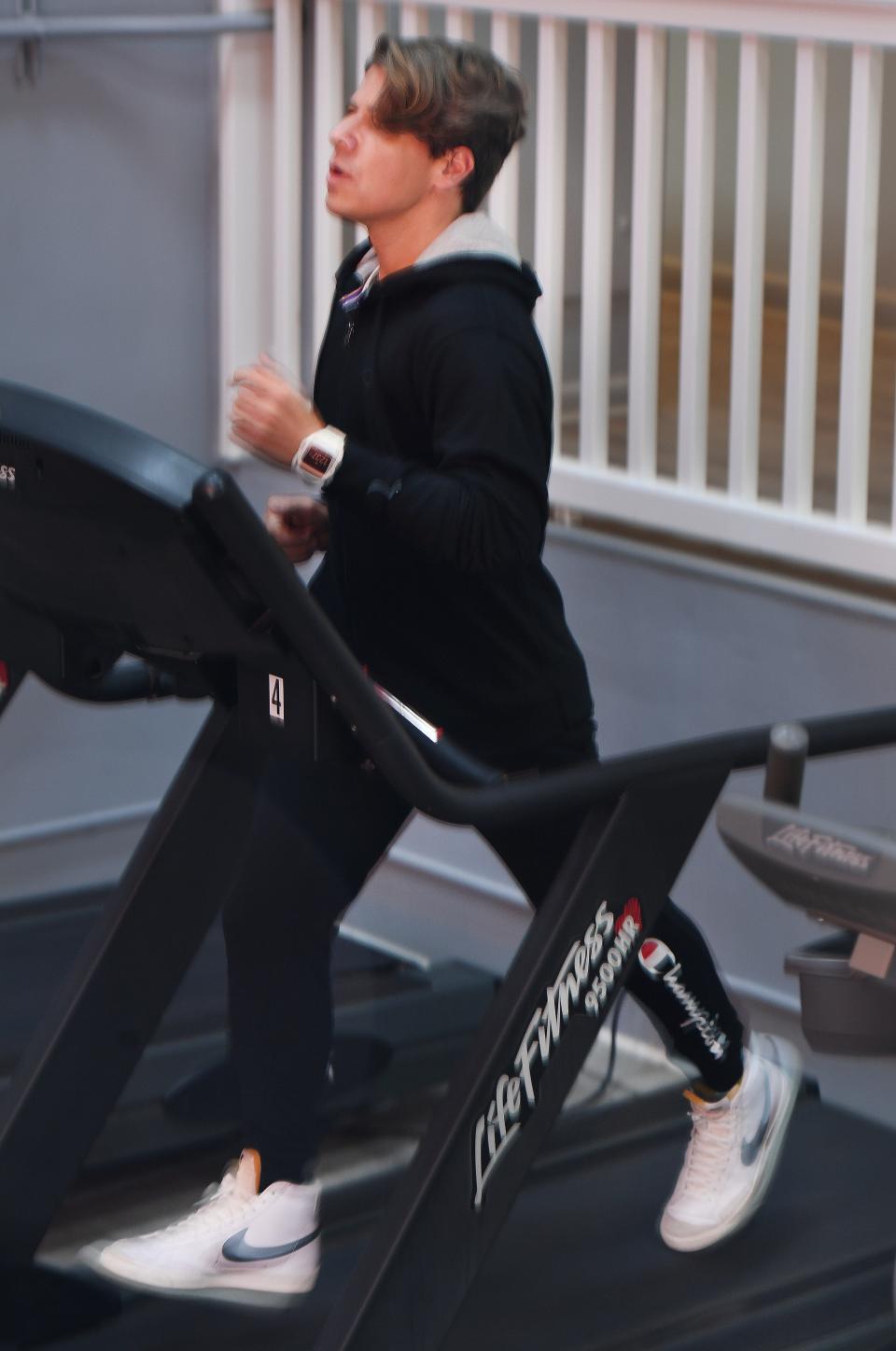 Personal trainer Justin Rollins on the treadmill at the Spartanburg Athletic Club.